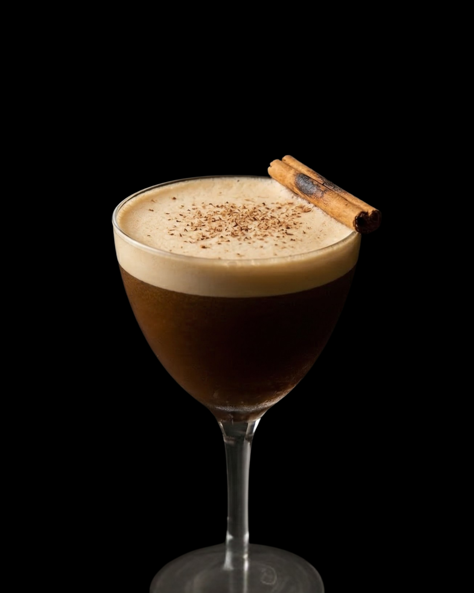 Espresso martini with silky plant-based foam crown and cinnamon garnish